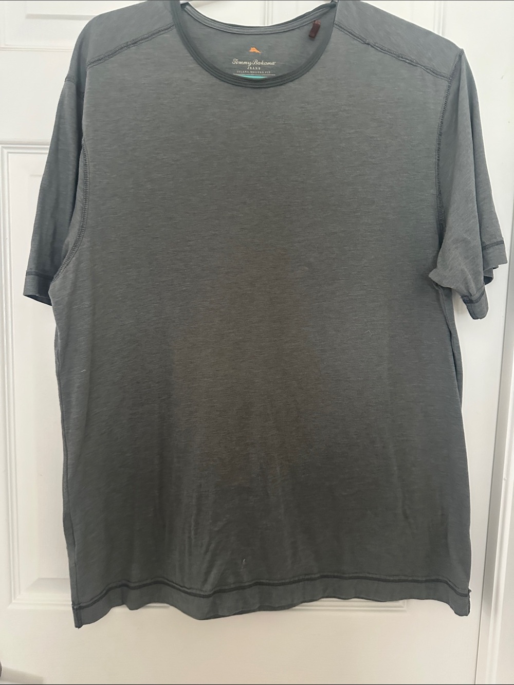 Tommy is a qBahama Men's Short Sleeve Crewneck Tee in Slate
